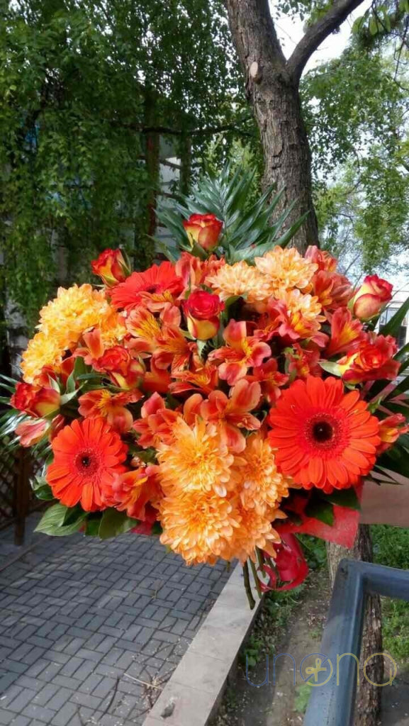 Orange roses, gerberas and chrysanthemums bouquet