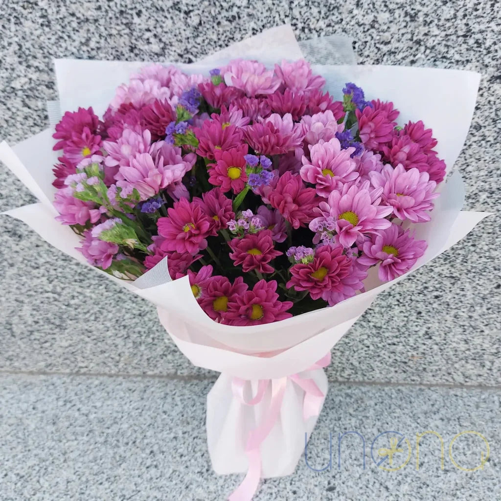 Pink chrysanthemums in different shades for flower delivery in Ukraine