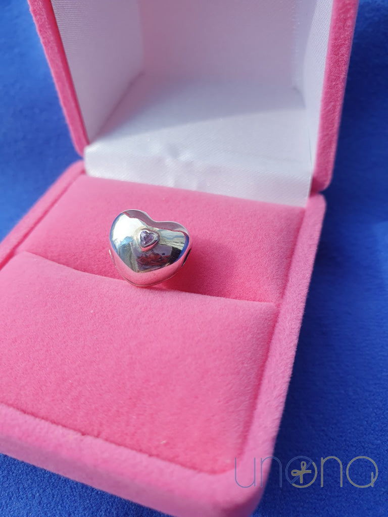 Silver heart charm with pink cubic zirconia