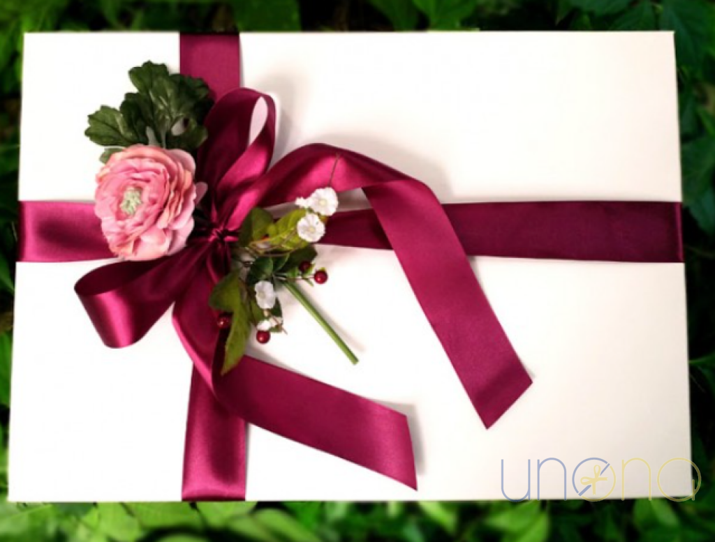 Premium chocolate gift box with handcrafted chocolates, macarons, tea, and sparkling wine for delivery throughout Ukraine