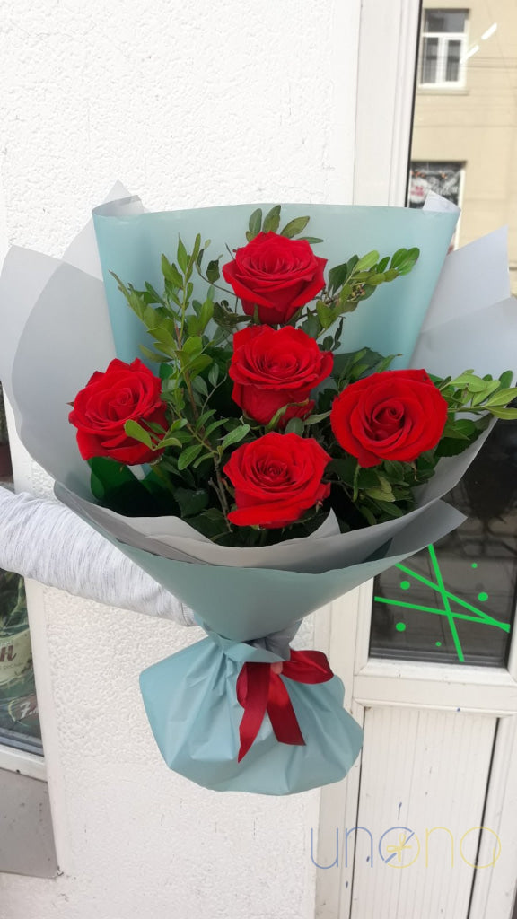 Premium floral arrangement with roses and eucalyptus