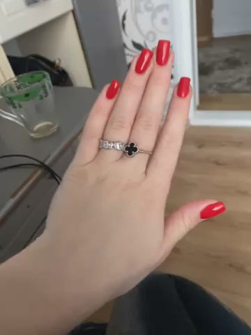 Elegant adjustable sterling silver ring with baguette-cut cubic zirconia stones for delivery in Ukraine