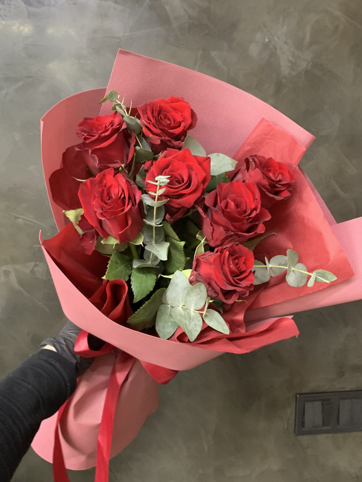 Cheerful red roses bouquet for her in Ukraine
