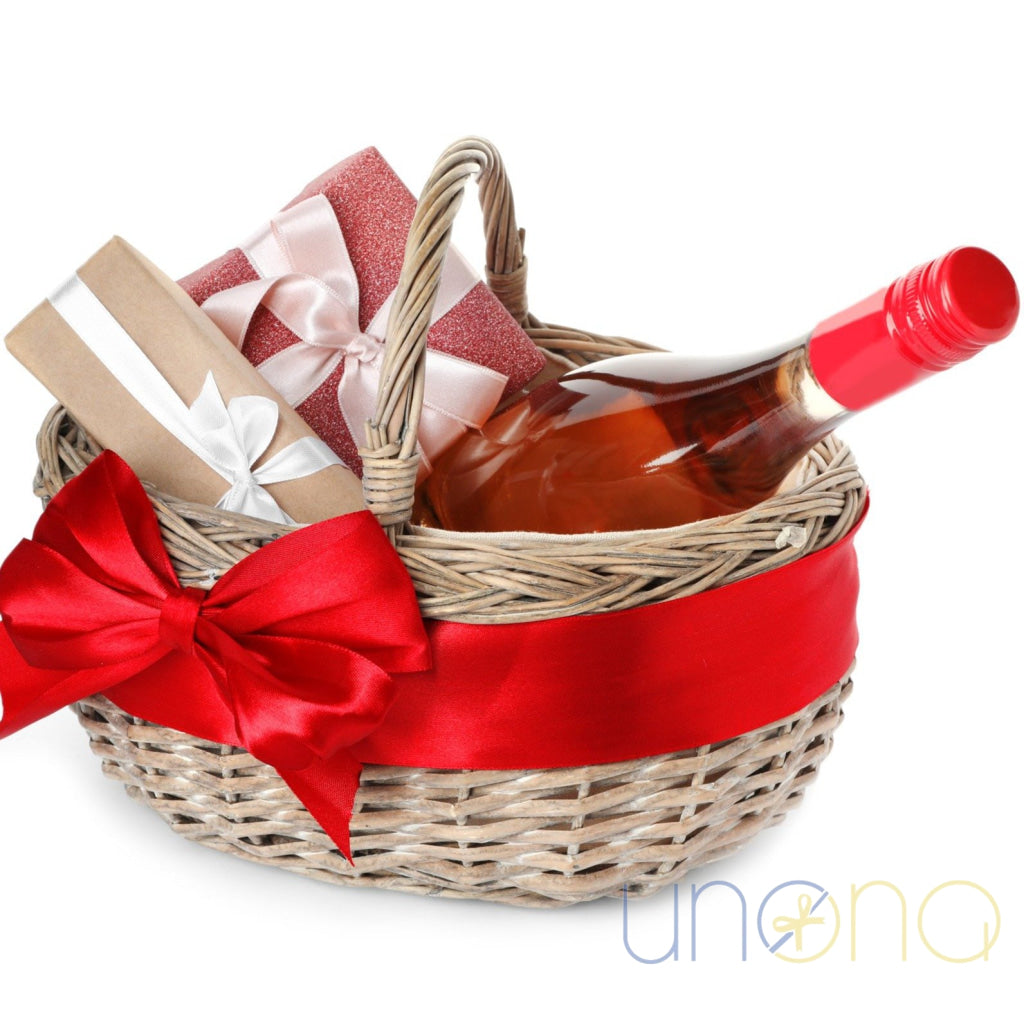 Romantic gift basket with imported rosé wine and macarons