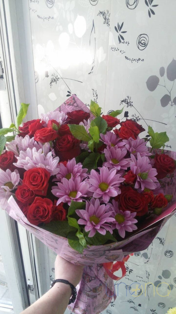 Pink roses and colorful chrysanthemums to send to Ukraine