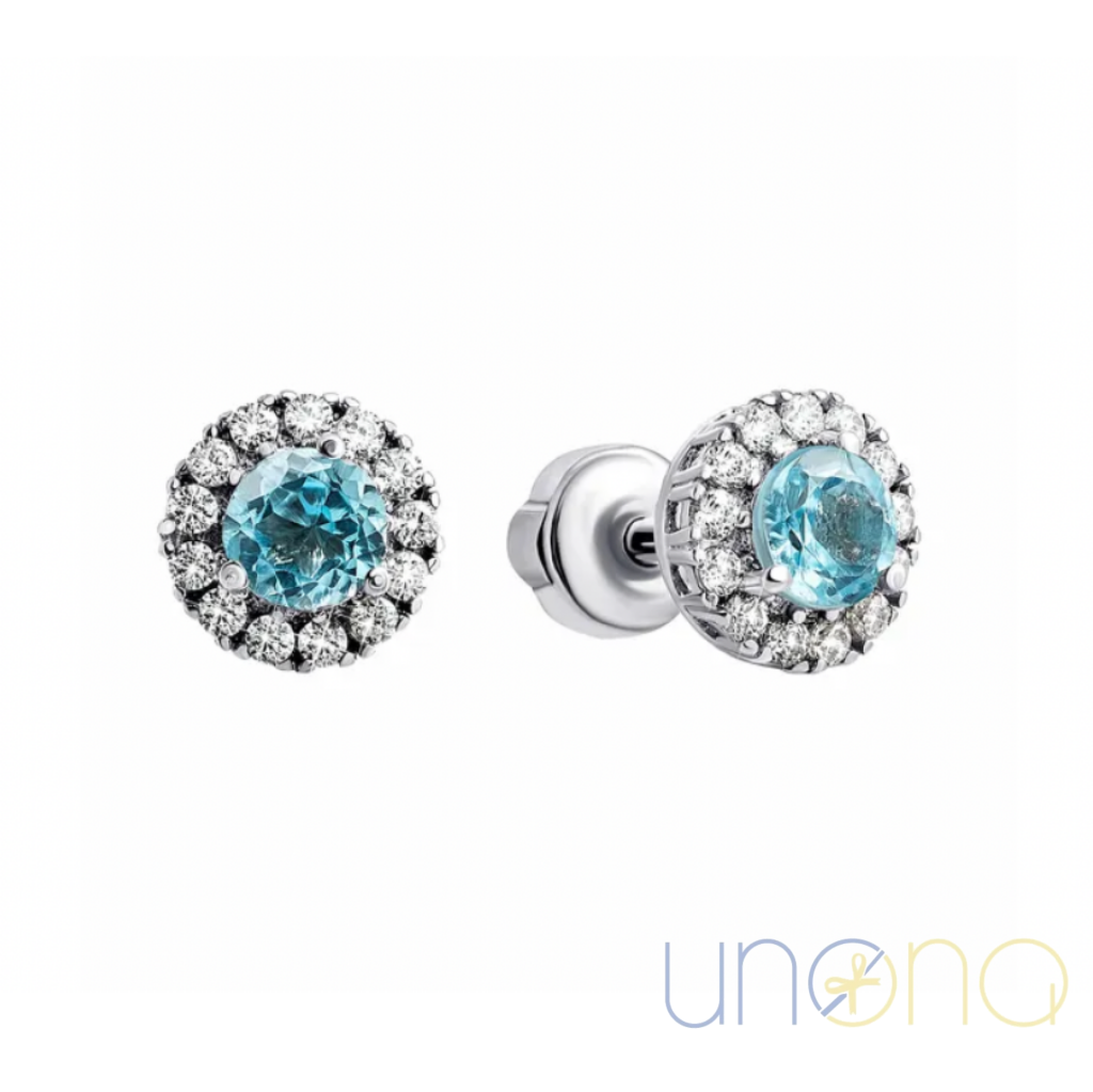 Sterling silver stud earrings with Swiss blue topaz and cubic zirconia
