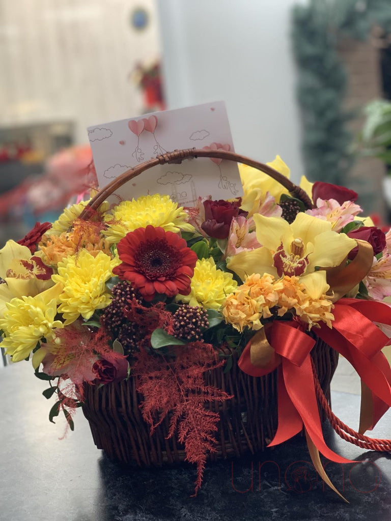 Seasonal chrysanthemum basket with colorful autumn flowers