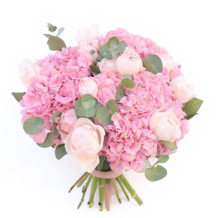 Elegant bouquet with pink hydrangea, peony roses and eucalyptus
