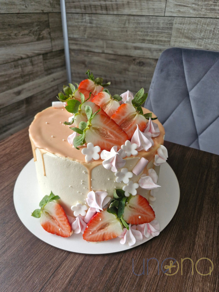 Handmade strawberry cake with pink chocolate drip delivered in Odesa