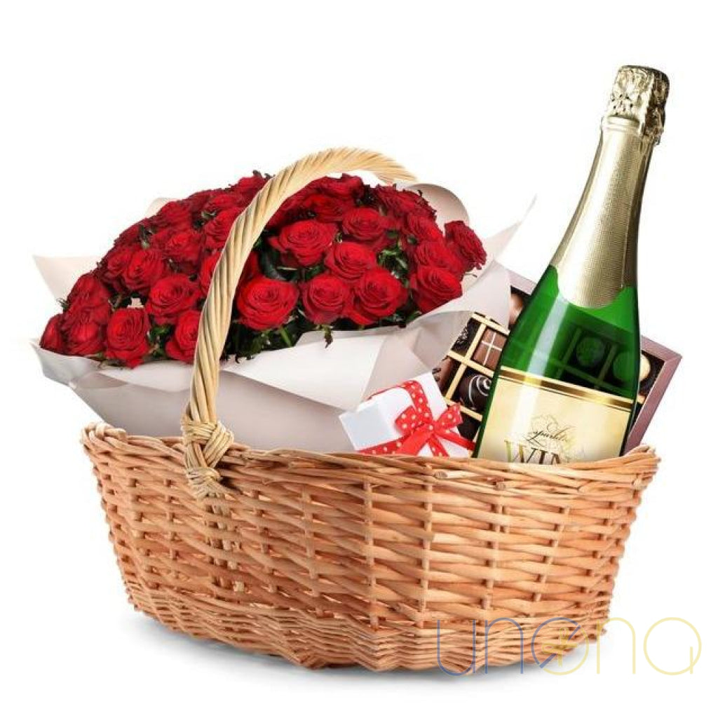 Sweet Surprise Gift Basket with 39 red roses, sparkling wine, Ferrero Rocher chocolates and premium Roshen chocolates for delivery in Ukraine