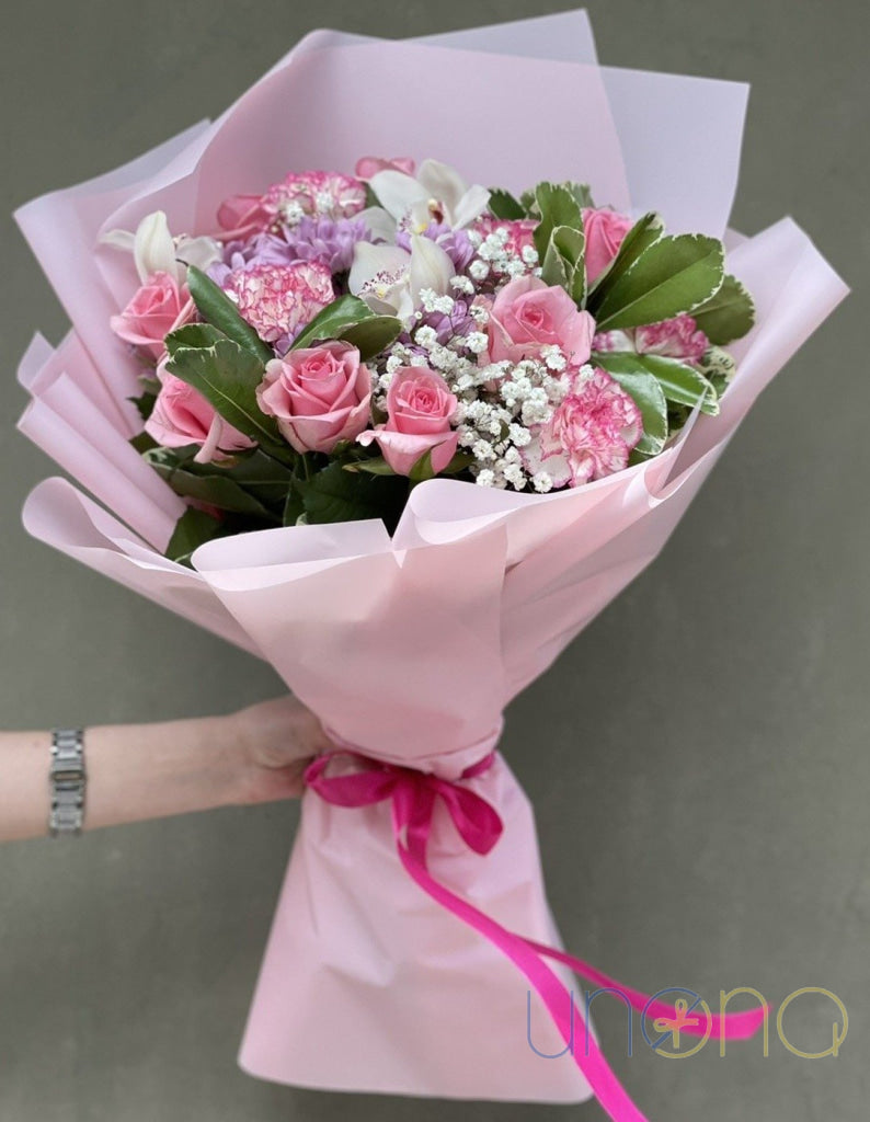 Pink roses and orchid with eucalyptus in luxury bouquet
